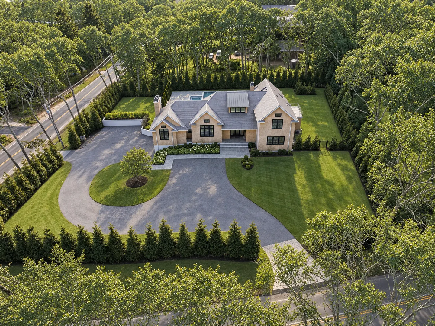 Aerial view of the completed ground-up residence in Water Mill